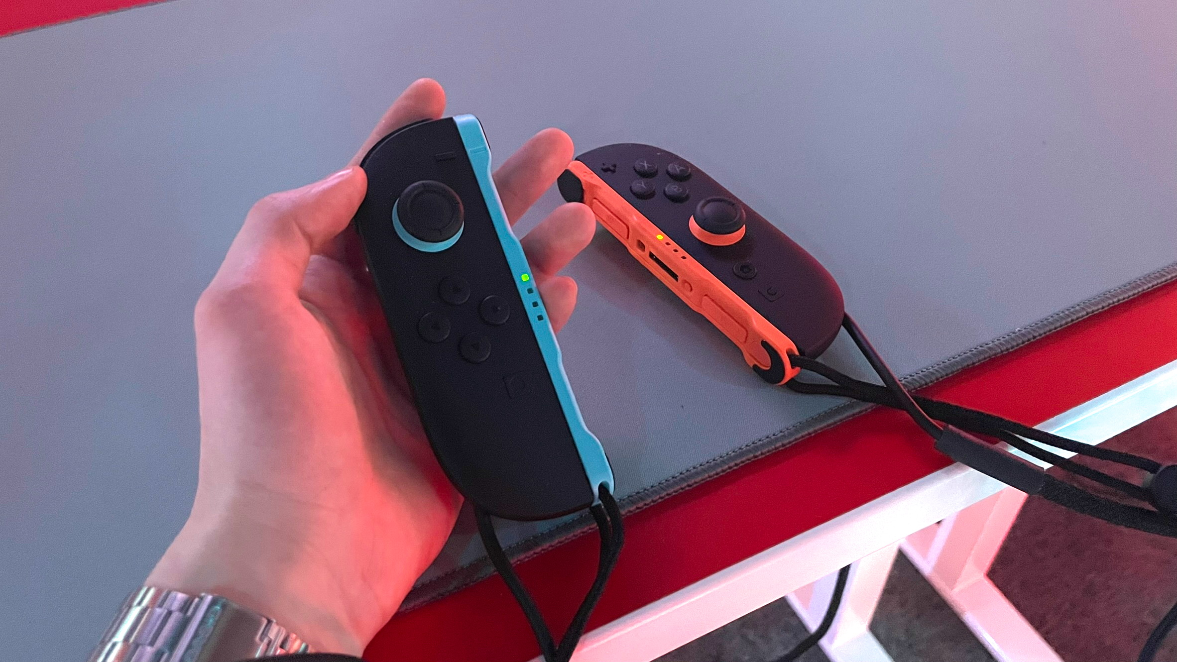 A hand holding the detached Switch 2 Joy-Cons at the Switch 2 NYC preview event on April 4, 2025